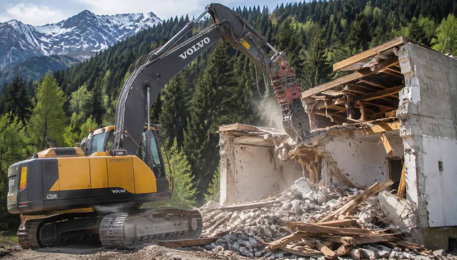 Representative image of an excavator demolishing a structure at a forest site